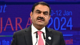 Gautam Adani, chair of Indian conglomerate Adani Group, addresses a gathering during the Vibrant Gujarat Global Summit 2024 in Gandhinagar, Gujarat, India, on Jan. 10, 2024.