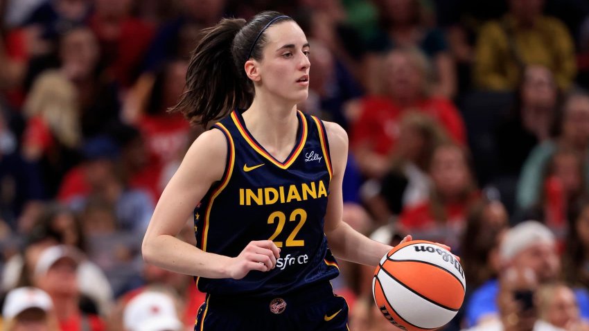 Caitlin Clark #22 of the Indiana Fever brings the ball up the court against the Dallas Wings at Gainbridge Fieldhouse on September 15, 2024 in Indianapolis, Indiana. 