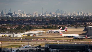 A general view of aircraft at Heathrow Airport in front of the London skyline on October 11, 2016 in London, England. 