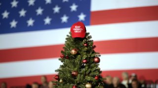 BATTLE CREEK, MICHIGAN – DECEMBER 18: A hat tops off a Christmas tree at a “Merry Christmas” rally hosted by U.S. President Donald Trump at the Kellogg Arena on December 18, 2019 in Battle Creek, Michigan. The House of Representatives will vote later today to determine if Trump will become the third president in U.S. history to be impeached.  (Photo by Scott Olson/Getty Images)