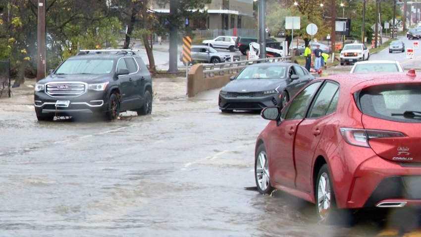 Cars on a flooded street in St. Louis County, Missouri.