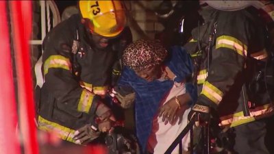 Woman rescued from burning West Oak Lane rowhome