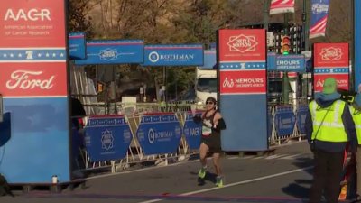 Runners cross finish line in the 2024 Dietz & Watson Philadelphia Half Marathon