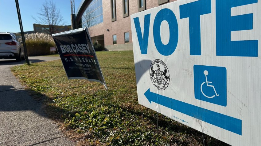 Vote and Bob Casey signs outside Scranton, Pa., polling place on Nov. 5, 2024.