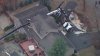 Crane topples over onto home in New Jersey