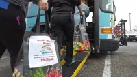 Bags of food being put on DART bus