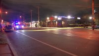 Police investigate after a man was killed early Sunday when an altercation at JJ's Café, a bar near the intersection of East Erie Avenue and J Street in Philadelphia's Juniata Park section, led to a shooting.