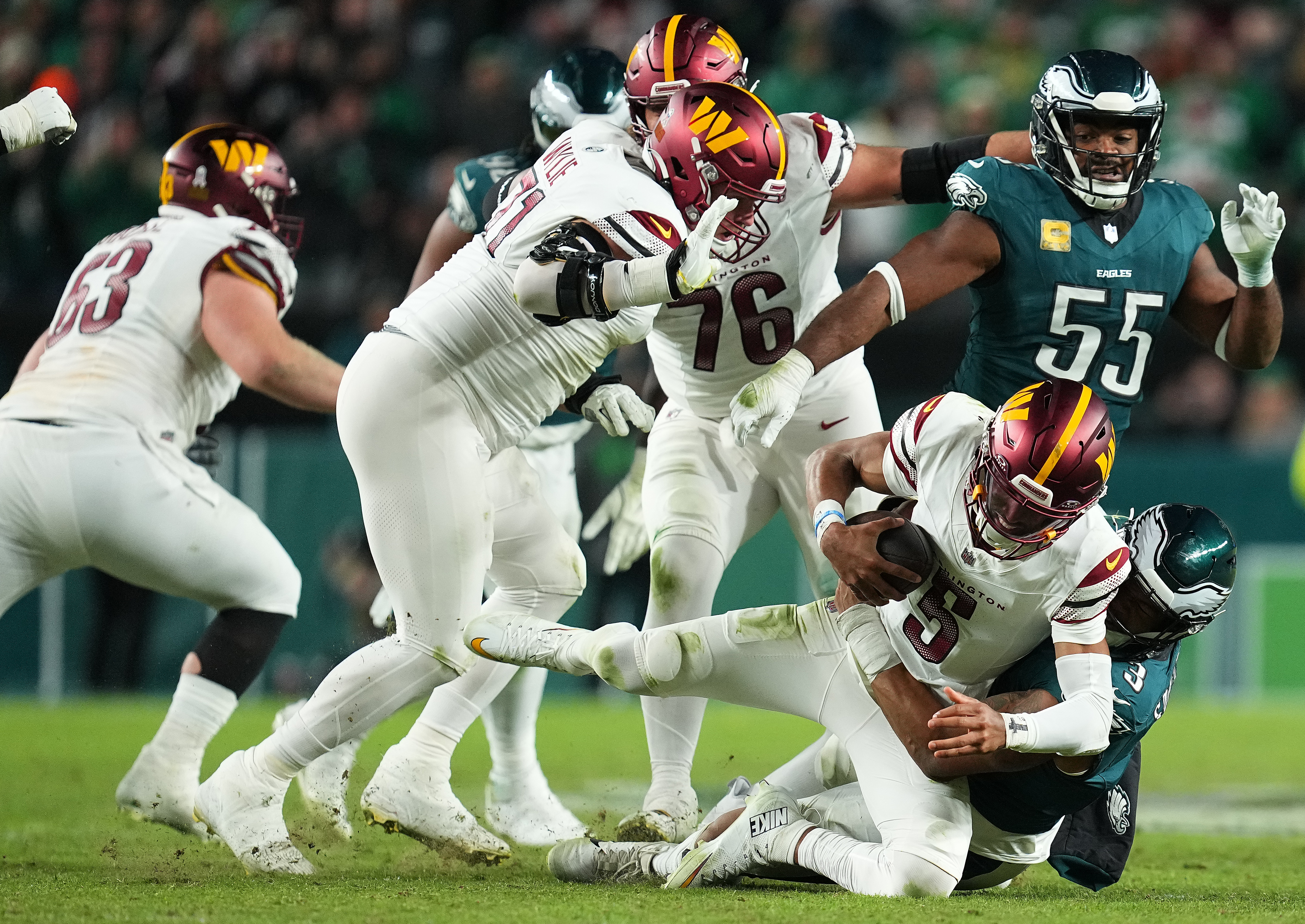 PHILADELPHIA, PENNSYLVANIA – NOVEMBER 14: Nolan Smith Jr. #3 of the Philadelphia Eagles sacks Jayden Daniels #5 of the Washington Commanders in the third quarter at Lincoln Financial Field on November 14, 2024 in Philadelphia, Pennsylvania. (Photo by Mitchell Leff/Getty Images)