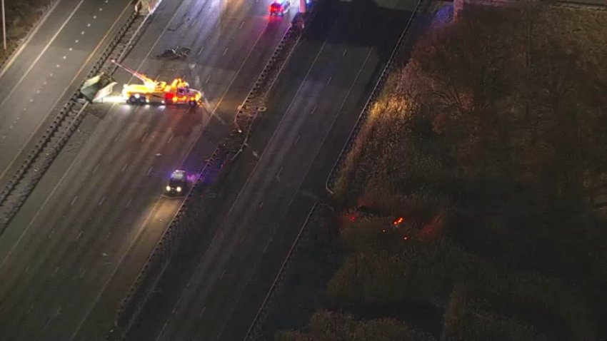 Truck into grass near crash scene