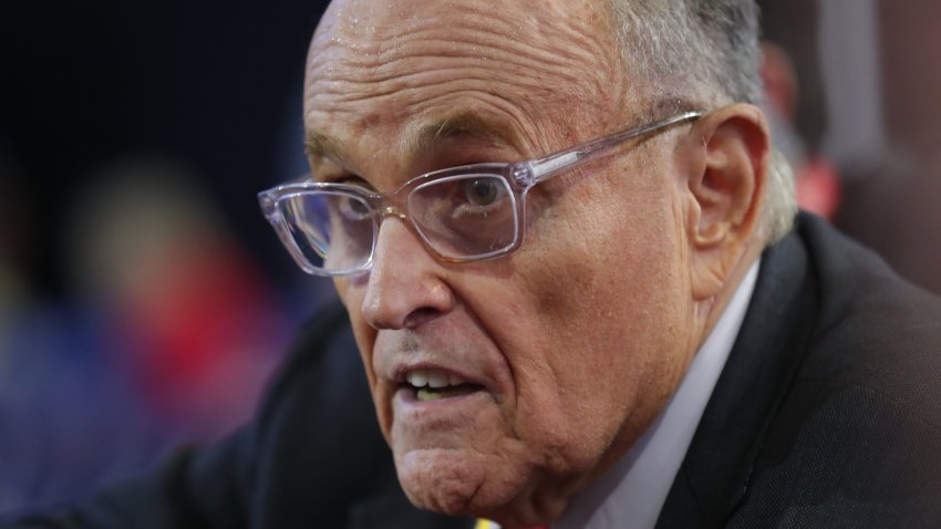 Rudy Giuliani, disbarred attorney and former adviser to Republican presidential nominee Donald J. Trump, is seen on the convention floor during the second day of the Republican National Convention at the Fiserv Forum. The second day of the RNC focused on crime and border policies.