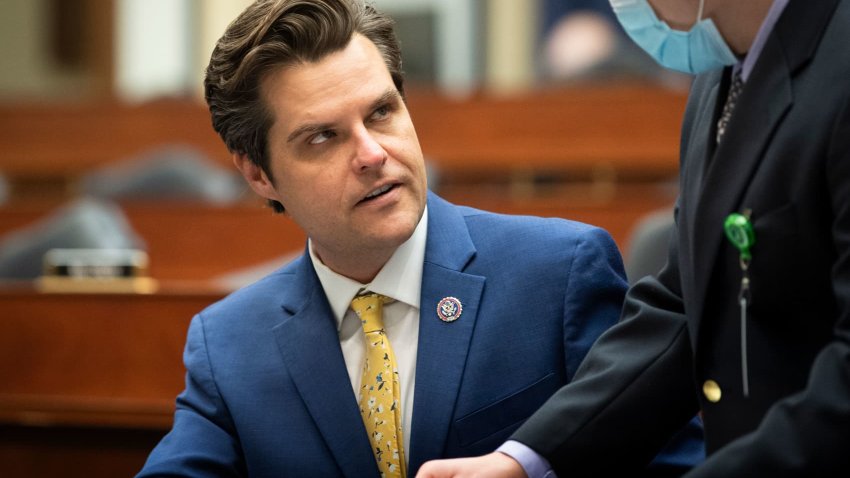 Rep. Matt Gaetz, R-Fla., talks with a staffer before the start of the House Armed Services Committee hearing on “An Update on Afghanistan in Washington on Wednesday, May 12, 2021.