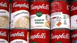 Cans of Campbell’s Soup are displayed on a shelf at Scotty’s Market on December 08, 2021 in San Rafael, California.