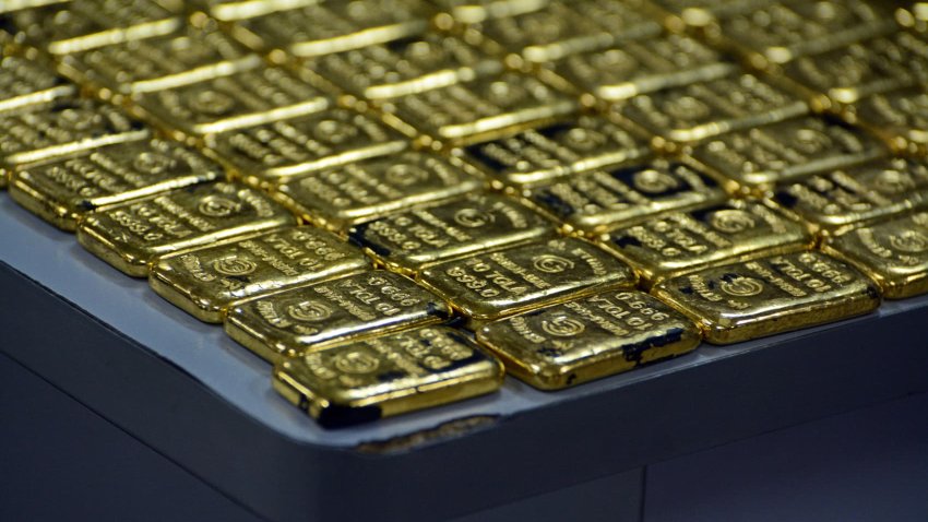 Close up stack of gold bars.