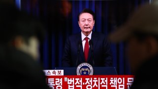 A screens shows footage of South Korean President Yoon Suk Yeol delivering an address to the nation at Seoul station on Dec. 7, 2024 in Seoul, South Korea.