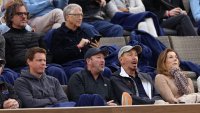 Larry Ellison and Monica Seles and Bill Gates (back row) watch Carlos Alcaraz of Spain play against Alexander Zverev of Germany in their Quarterfinal match during the BNP Paribas Open in Indian Wells, California, on March 14, 2024.