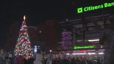 Keith Jones, Brenna Weick flip switch on Citizen Bank Park's Phillies tree