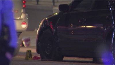 Man shot, killed while sitting in car, bystander hurt