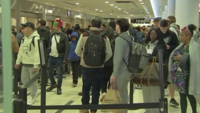 Passengers prepare for holiday travel at Philadelphia International Airport