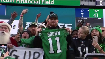 Eagles fan gives Tanner McKee his first touchdown ball back after A.J. Brown throws it to him