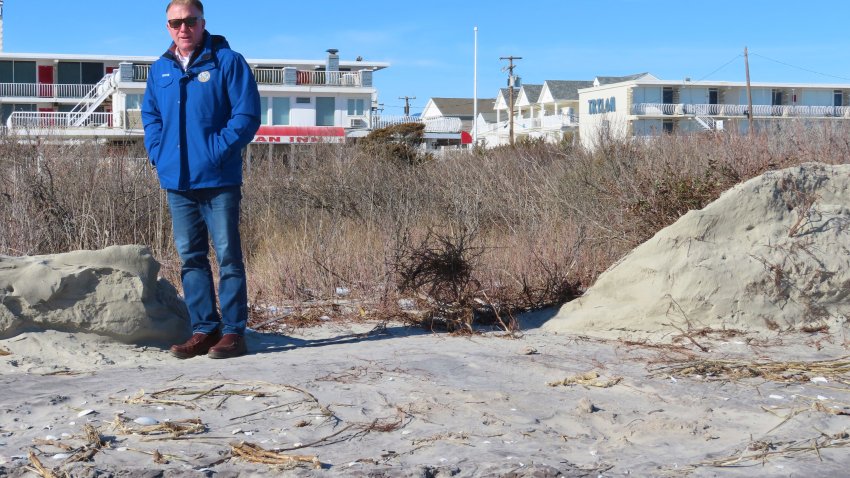 Mayor Patrick Rosenello stands next to a destroyed section of sand dune in North Wildwood N.J. on Jan. 22, 2024.