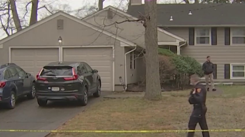 Police investigate after a man's body was found outside a home in Cherry Hill, New Jersey on Tuesday, Dec. 10, 2024.