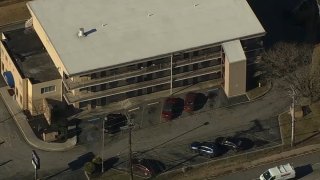 Police officials say a man was killed in the parking lot of this Budget Inn in New Castle, Del. on Sunday, Dec. 22, 2024.