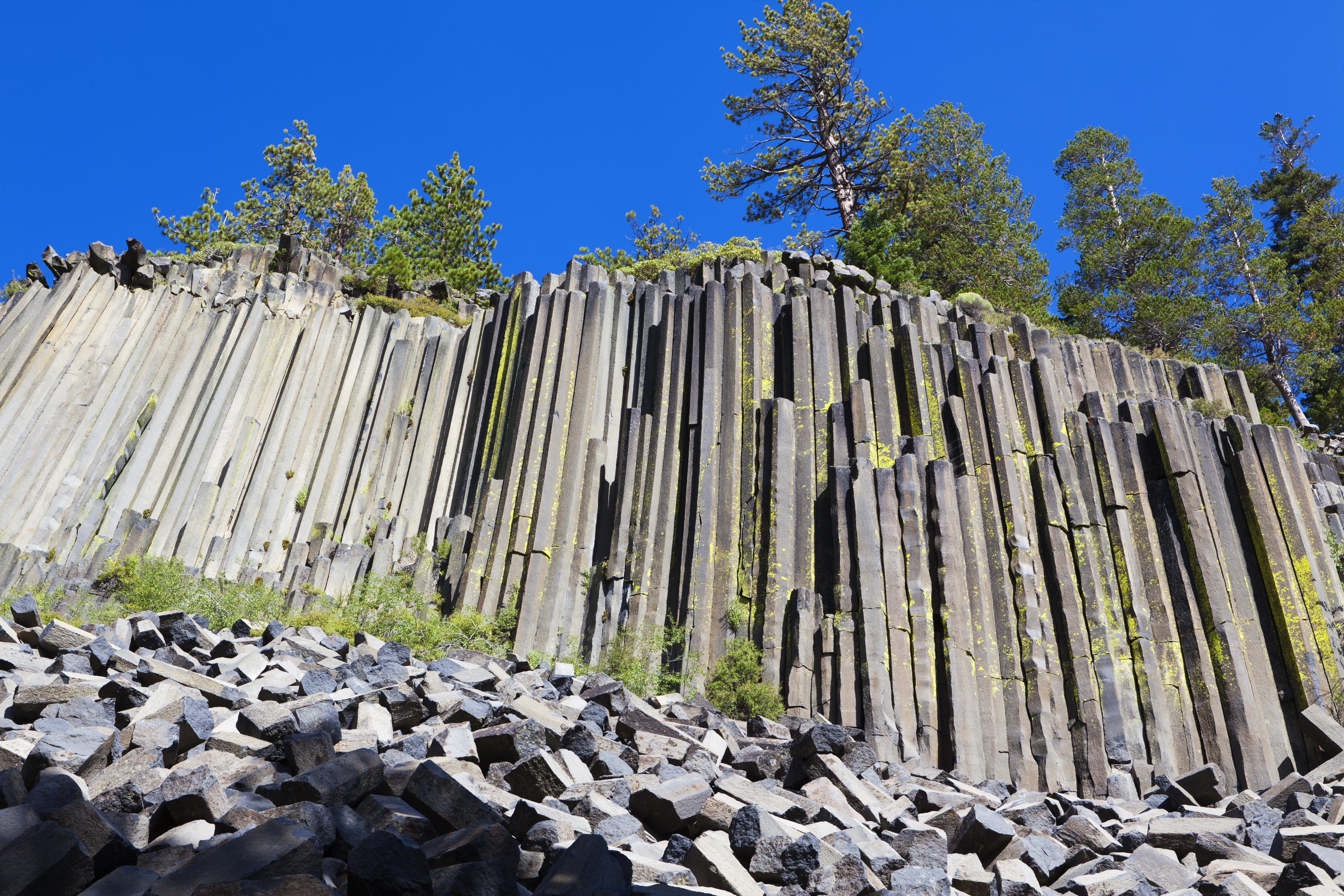 Outstanding Formation of Columnar Basalt. The 60-foot-high sheer wall was exposed during the last glaciation. National Monument near Mammoth Lakes, California.