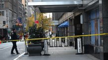 MANHATTAN, NEW YORK, UNITED STATES - DECEMBER 4: Police officers take security measures as CEO of UnitedHealthcare Brian Thompson shot and killed in Midtown Manhattan, New York, United States on December 4, 2024. The CEO of UnitedHealthcare was killed in a Midtown shooting near a hotel on 54th Street between 6th and 7th Avenues. He was rushed to an area hospital and later died. (Photo by Kyle Mazza/Anadolu via Getty Images)