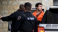 HOLLIDAYSBURG, PENNSYLVANIA – DECEMBER 10: Luigi Mangione is led into the Blair County Courthouse for an extradition hearing December 10, 2024 in Hollidaysburg, Pennsylvania. Mangione has been arraigned on weapons and false identification charges related to the fatal shooting of United Healthcare CEO Brian Thompson in New York City. Mangione is incarcerated in the State Correctional Institution in Huntingdon, Pennsylvania awaiting extradition to New York. (Photo by Jeff Swensen/Getty Images)