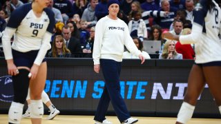 Katie Schumacher-Cawley Head Coach of the Penn St. Nittany Lions looks towards the court during the Division I Women's Volleyball Championship against the Louisville Cardinals