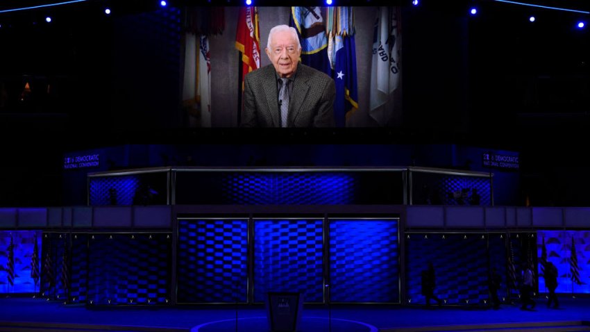 Former President Jimmy Carter is seen on the big screen during Day 2 of the Democratic National Convention at the Wells Fargo Center in Philadelphia, Pennsylvania, July 26, 2016. (Photo by SAUL LOEB / AFP) (Photo by SAUL LOEB/AFP via Getty Images)