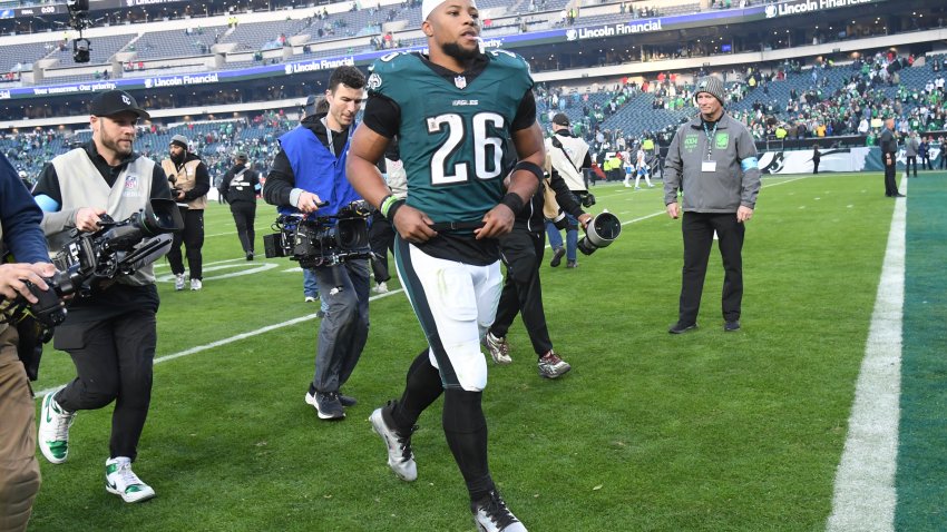 Dec 8, 2024; Philadelphia, Pennsylvania, USA;  Philadelphia Eagles running back Saquon Barkley (26) runs off the field after win against the Carolina Panthers at Lincoln Financial Field. Mandatory Credit: Eric Hartline-Imagn Images