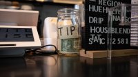 A tip jar at a cafe in the Brooklyn borough of New York, U.S., on Friday, Aug. 23, 2024.