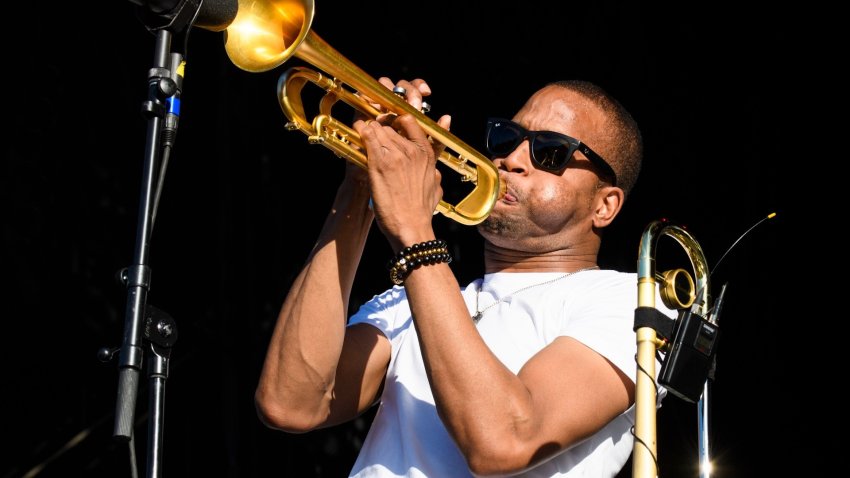 Trombone Shorty performing at a concert.