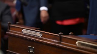 The desk of hospitalized Pennsylvania state Rep. Matt Gergely, D-Allegheny, is empty at the start of the state House's new two-year legislative session, Jan. 7, 2025, in Harrisburg, Pa.