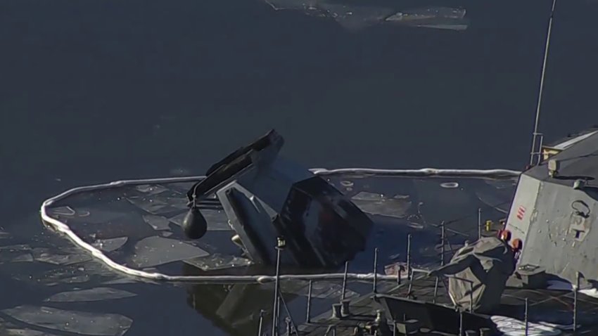 Ship partially submerged in water