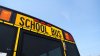 Police search for driver accused of pointing gun at students on school bus