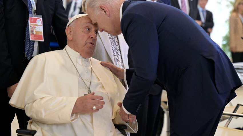 Pope Francis greets US President Joe Biden before to take part in a working session on Artificial Intelligence (AI), Energy, Africa-Mediterranean at the Borgo Egnazia resort during the G7 Summit in Savelletri near Bari, Italy, on June 14, 2024.