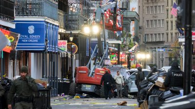 Driver speeds through crowd in New Orleans, killing up to 15 and injuring dozens