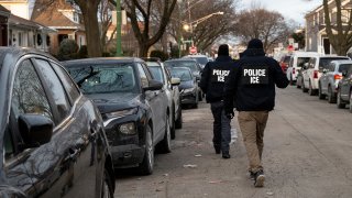 U.S. Immigration and Customs Enforcement (ICE) agents during an enforcement operation in Chicago on Sunday.