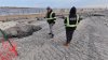 What's causing huge holes to form in sand at a popular Jersey Shore beach?