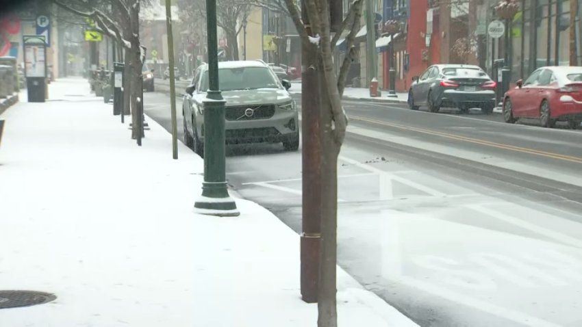 Snow on sidewalk, road