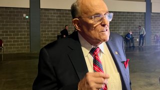 Former New York City Mayor Rudy Giuliani talks to the media during Donald Trump’s election night watch party at the Palm Beach County Convention Center on Tuesday, Nov. 5.