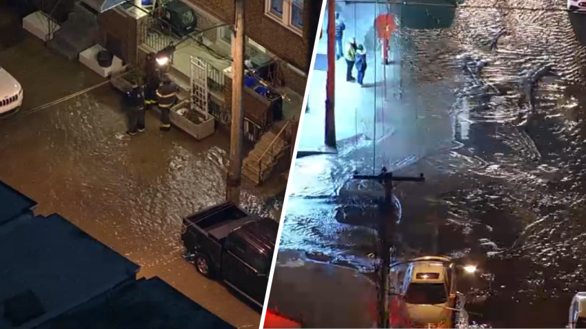 Water flooding the streets of the Grays Ferry neighborhood of Philadelphia