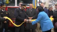 Philadelphia Fire Commissioner Jeffery Thompson and Mayor Cherelle Parker hook up a hose to celebrate the reopening of Port Richmond's Engine 6 on Thursday, Jan. 9, 2025.