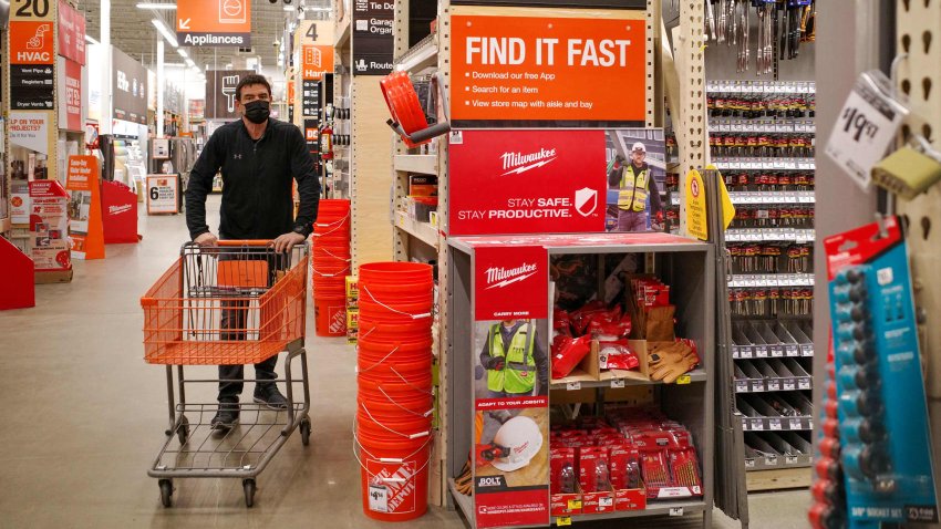 People shop at a home improvement store in Bethesda, Maryland, on February 17, 2022.