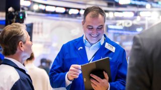 Traders work on the floor of the New York Stock Exchange on Feb. 4, 2025. 