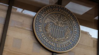 The seal of the U.S. Federal Reserve Board of Governors near the Marriner S. Eccles Federal Reserve building in Washington, D.C., U.S., on Sunday, Jan. 12, 2025.