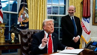 US President Donald Trump speaks while signing an executive order in the Oval Office of the White House to impose 25% tariffs on all US imports of steel and aluminum, broadening his trade restrictions to some of the country’s top trading partners.