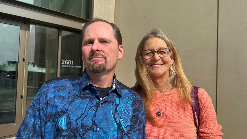 FILE – Richard Rogers and his wife Laurie stand outside the James F. Battin Federal Courthouse, Tuesday, Oct. 1, 2024, in Billings, Mont.